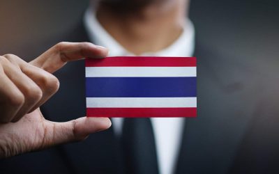 Businessman Holding Card of Thailand Flag