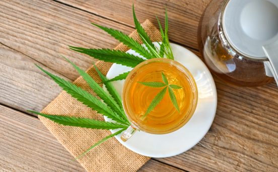 cannabis-tea-herbal-on-tea-cup-with-cannabis-leaf-marijuana-leaves-herb-health-tea-with-hemp-leaf-plant-thc-cbd-herbs-food-and-medical-scaled-1.jpg