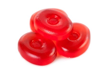 Juicy red candies isolated  on a white background